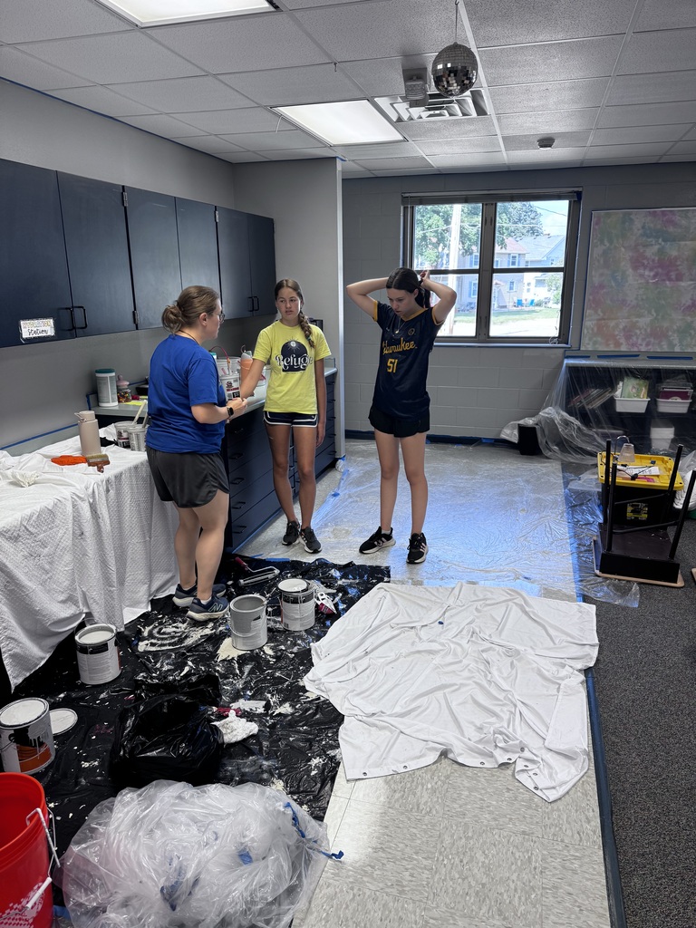 people in a classroom painting