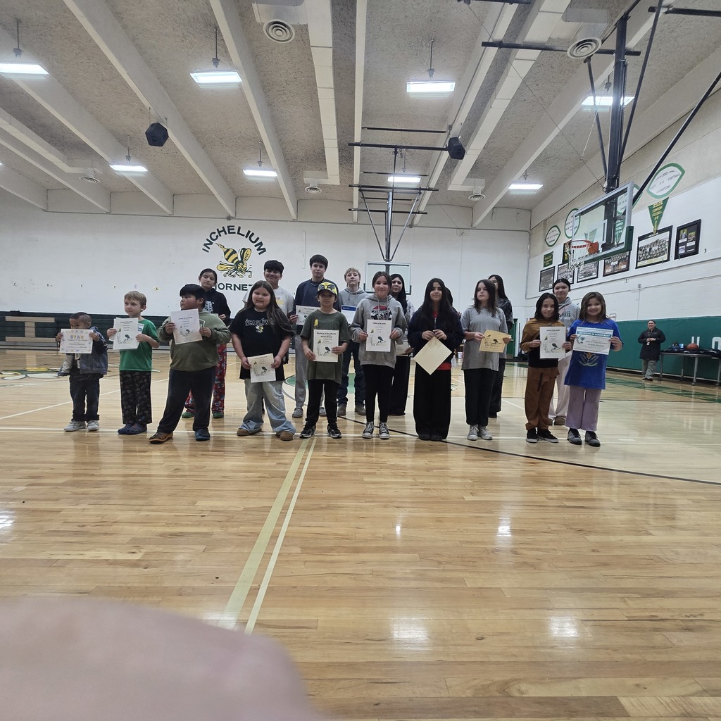 Pictures of award recipients holding awards 