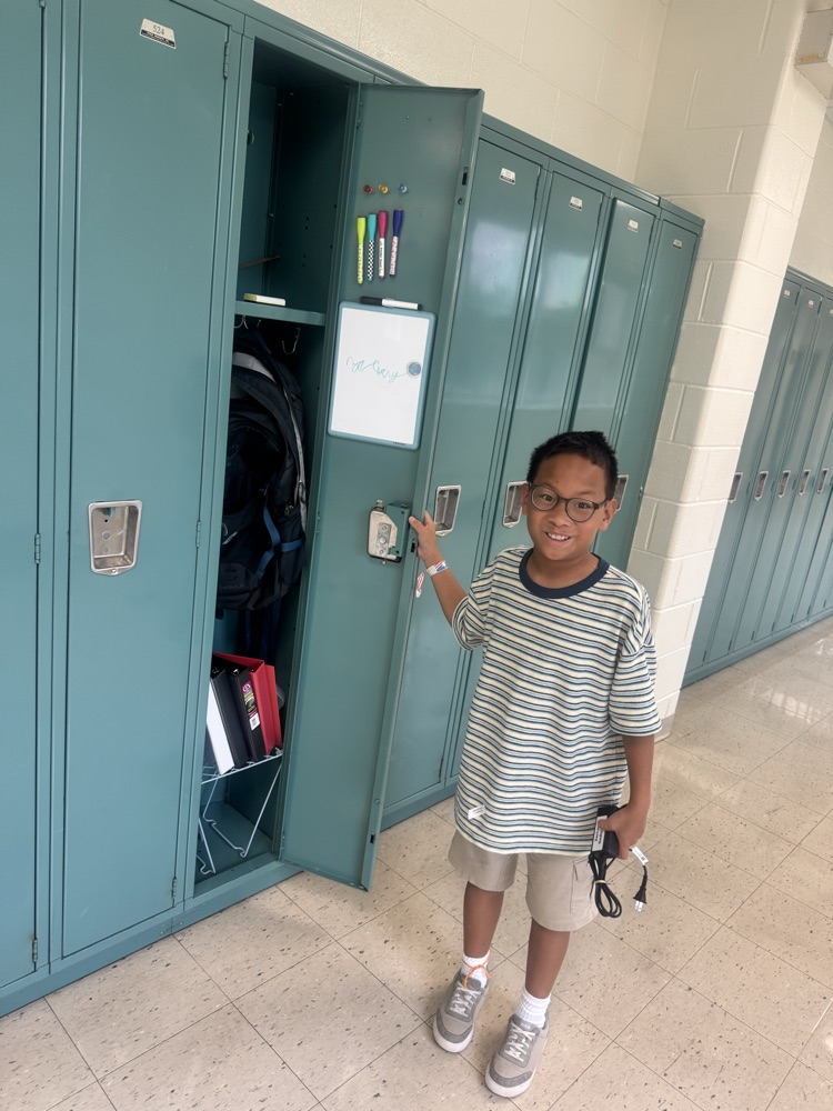 5th graders happy to use their new lockers!