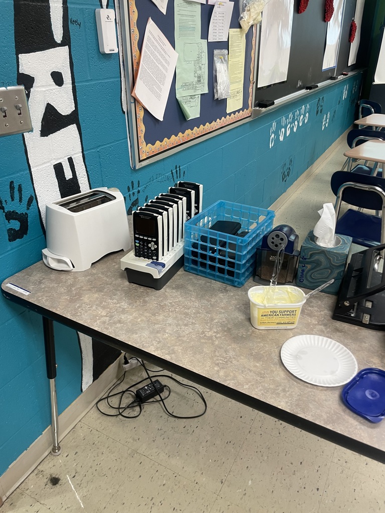 Chef Corpuz was in full uniform — hat, apron, bread, butter, and toaster — all to help students tackle parallel lines and proportionality.  The class kicked off by solving the mystery of “The Burnt Toast.” The storyline? A husband attempts to make breakfast but slices freshly baked bread unevenly — not parallel to the original cut — leading to a breakfast fail. From there, students connected the (slightly crispy) dots to the Triangle Proportionality Theorem: when a line is parallel to one side of a triangle, it divides the other two sides proportionally.  This hands-on (and tasty!) lesson brought similarity, dilation, and trigonometry to life — concepts used in architecture, design, and indirect measurement. And yes, students got to enjoy a slice of freshly cut bread while applying the theorem to solve the mystery.  Real-world math. Memorable visuals. And learning that’s anything but stale.  Nice work, Mr. Corpuz and our IHS Math Department!