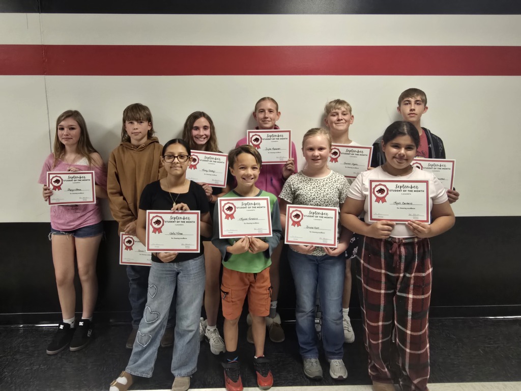 Group of young students smiling and holding certificates