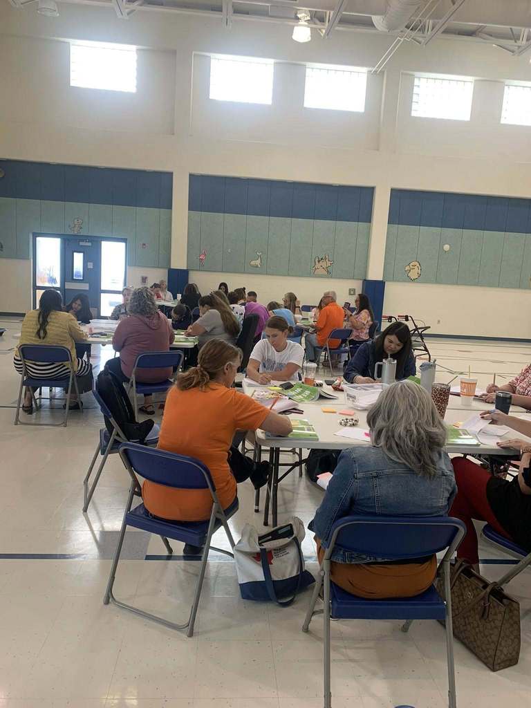 teachers working collaboratively during a training session.