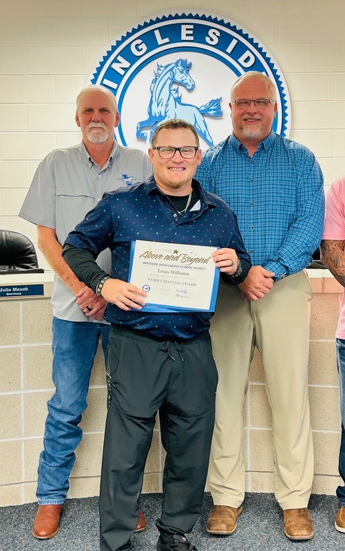 Coach Williams with Board President and Superintendent