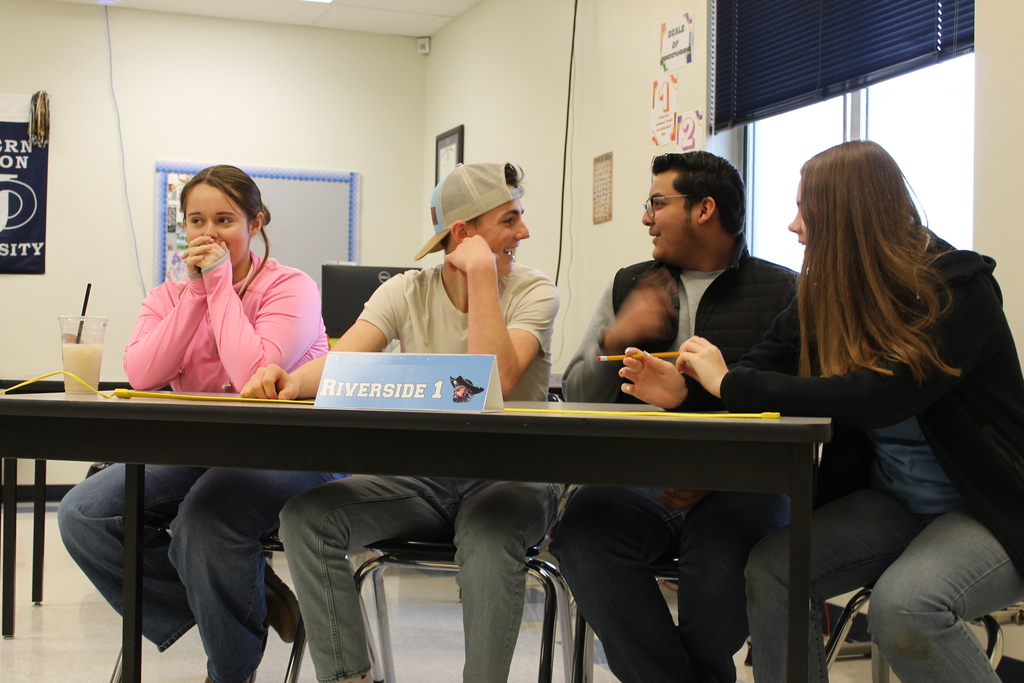 Students discuss their answer