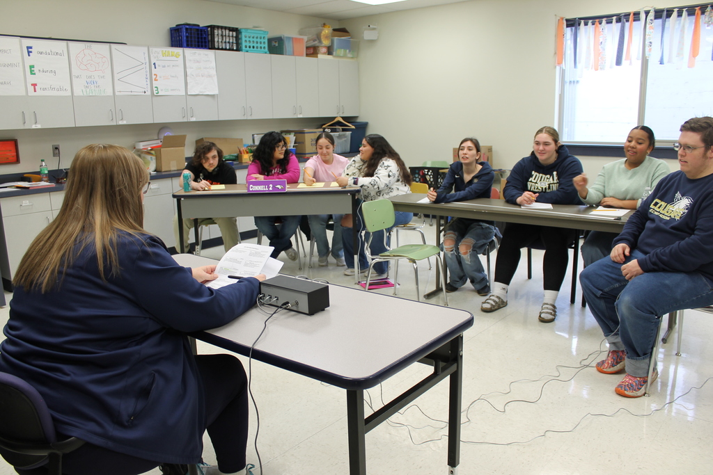 Students wait to hear the question