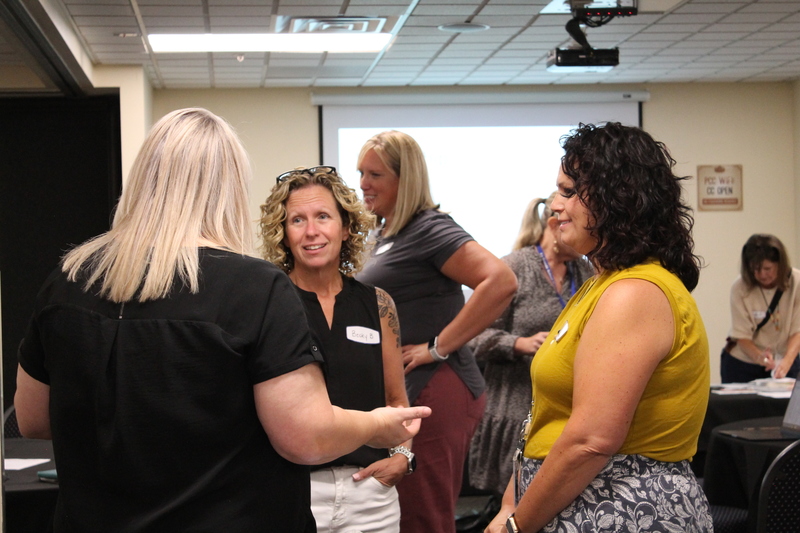 School Administrators exchange ideas