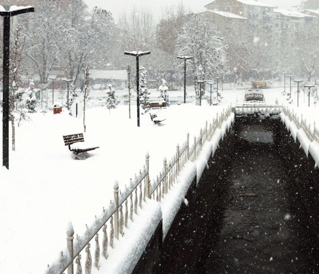 A snowy empty street.
