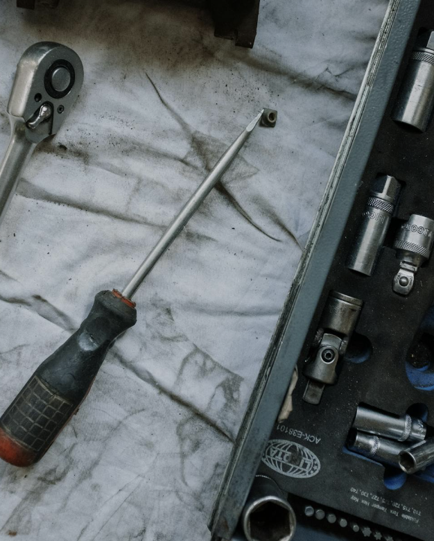 A socket wrench and toolbox.