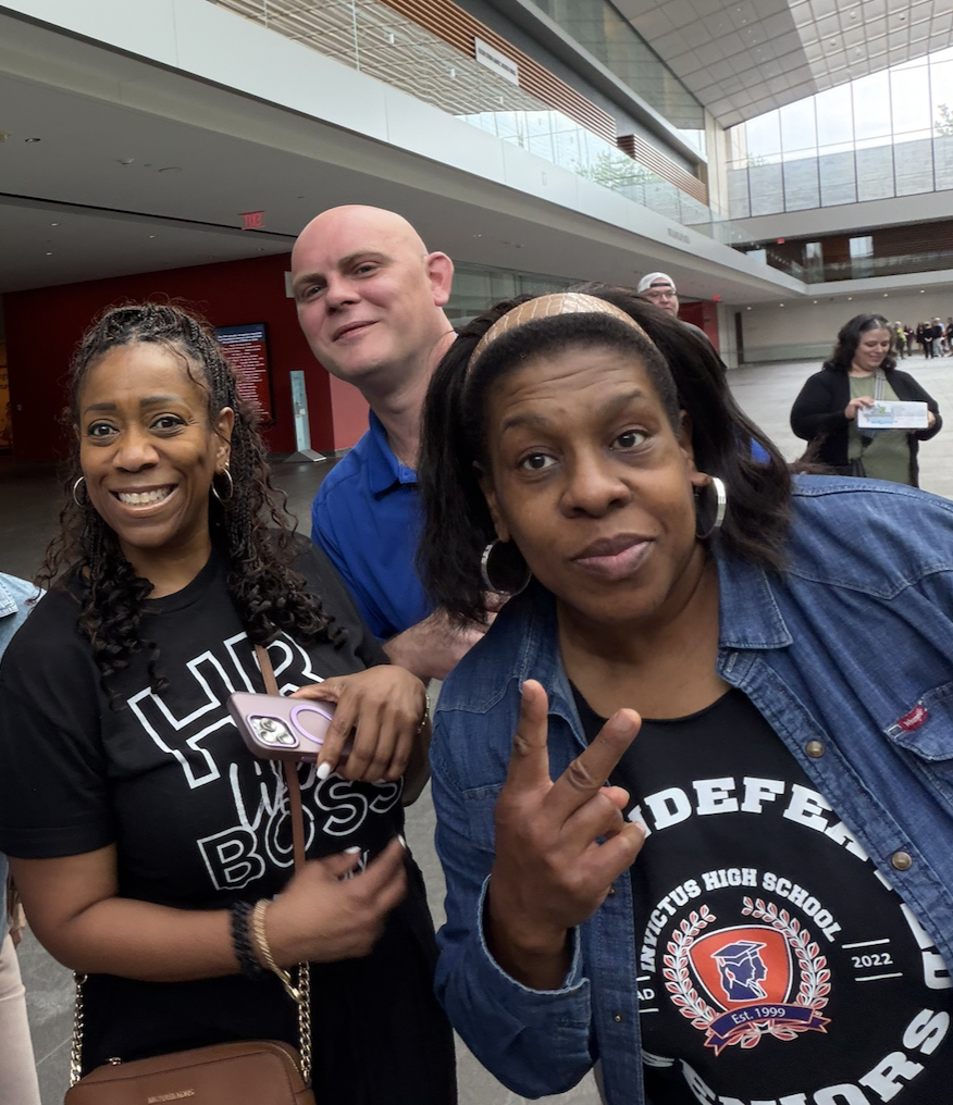 3 Invictus Staff members take a selfie