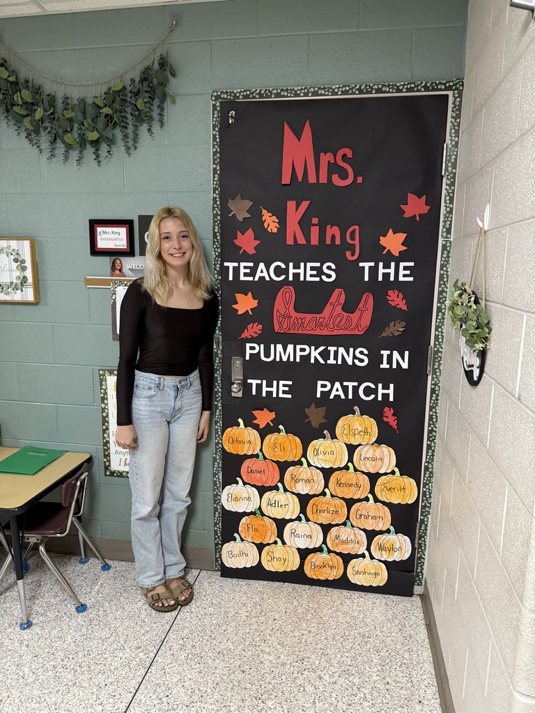 Student by classroom door