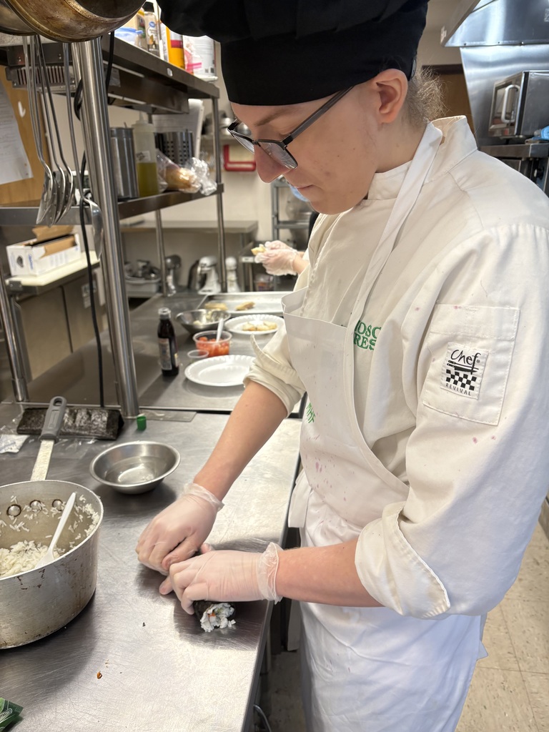 student preparing sushi