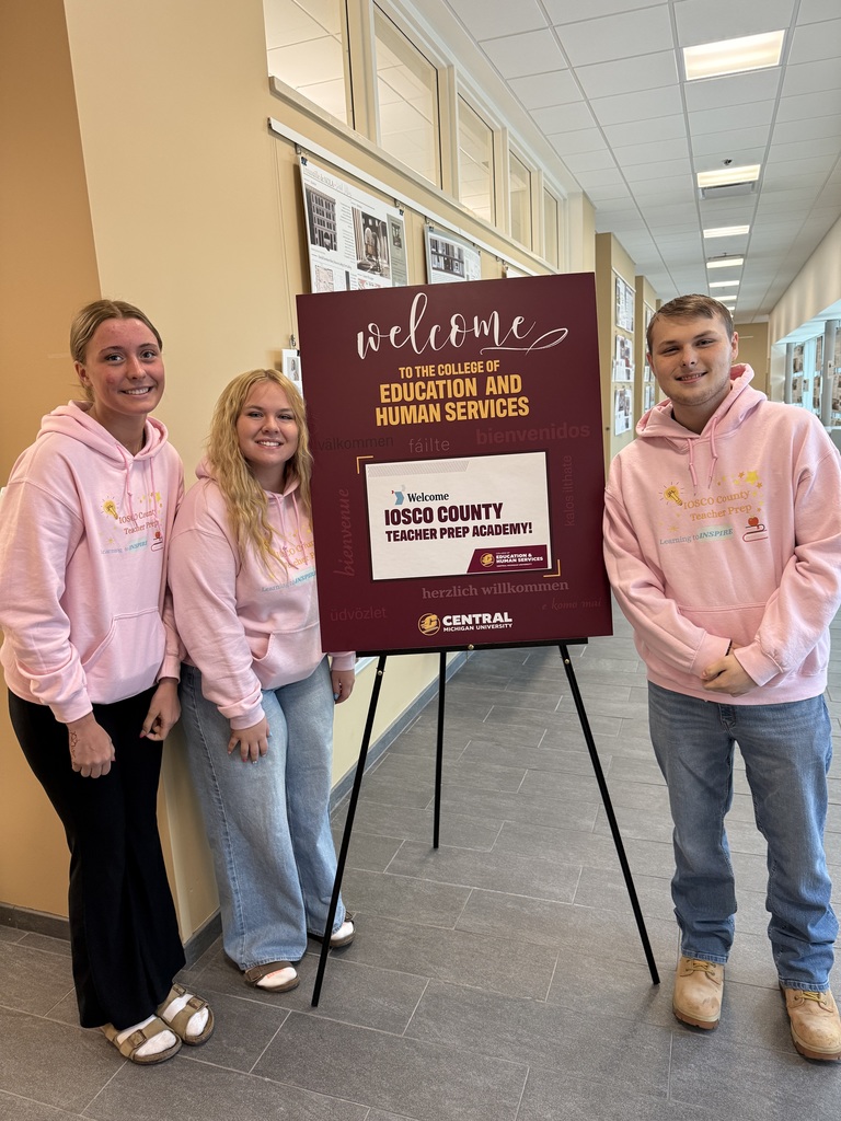 students with welcome sign