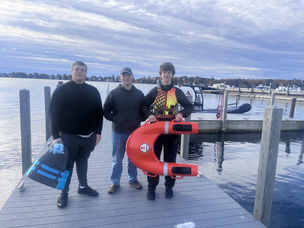 Students with water rescue person