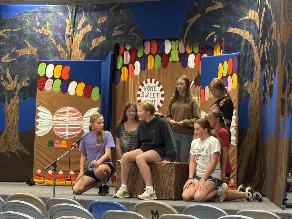 students on stage 