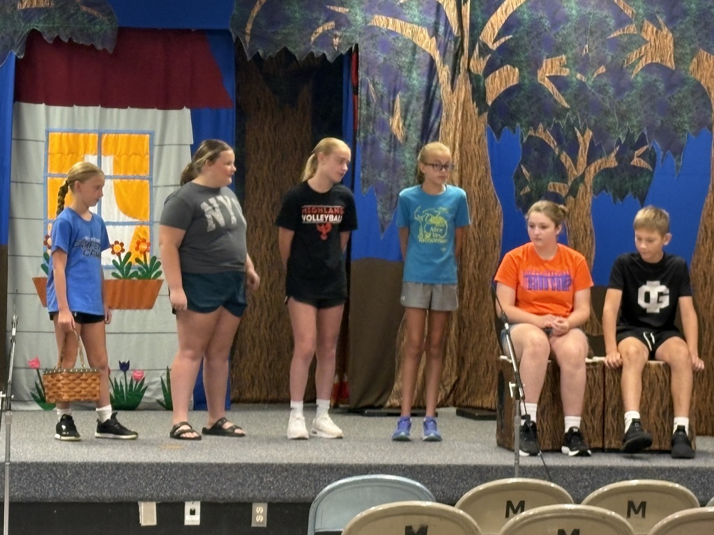 6 students on stage 