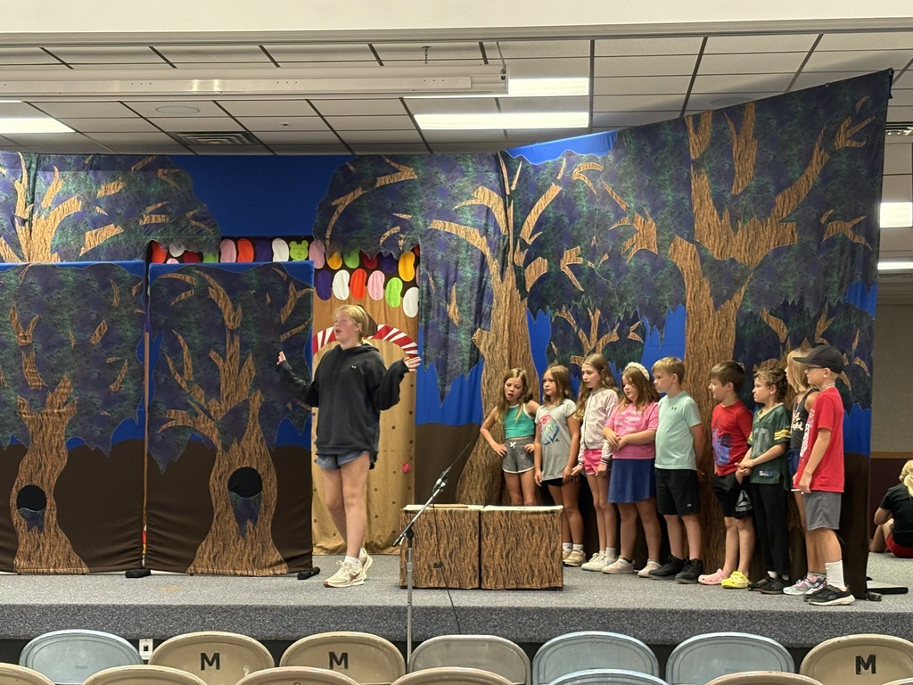 students on stage 