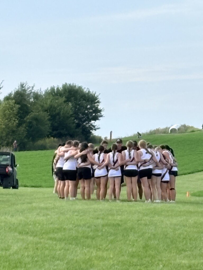 Girls team pre-race huddle