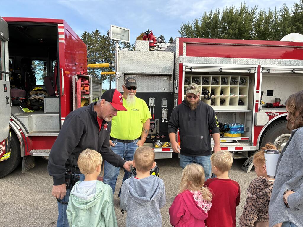 Monfort Fire Fighters demonstrating tools to our students.