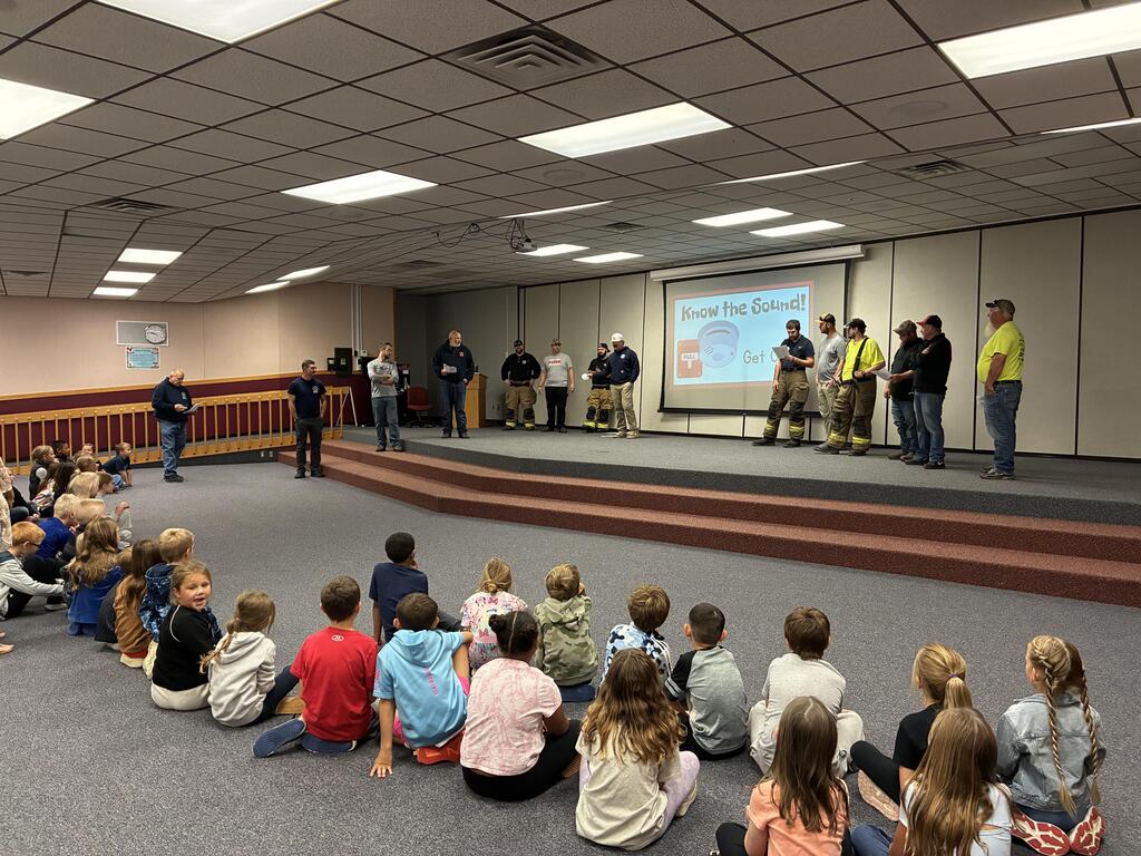 Students in the classroom learning about fire prevention.
