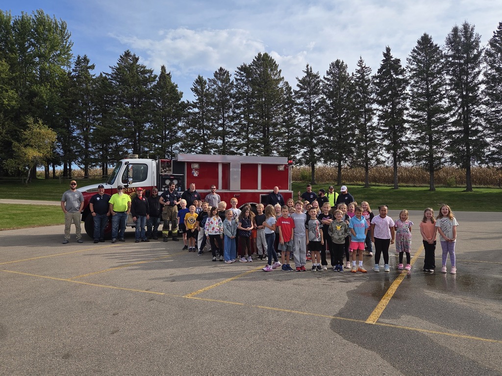 Students outside the Rewey firetruck