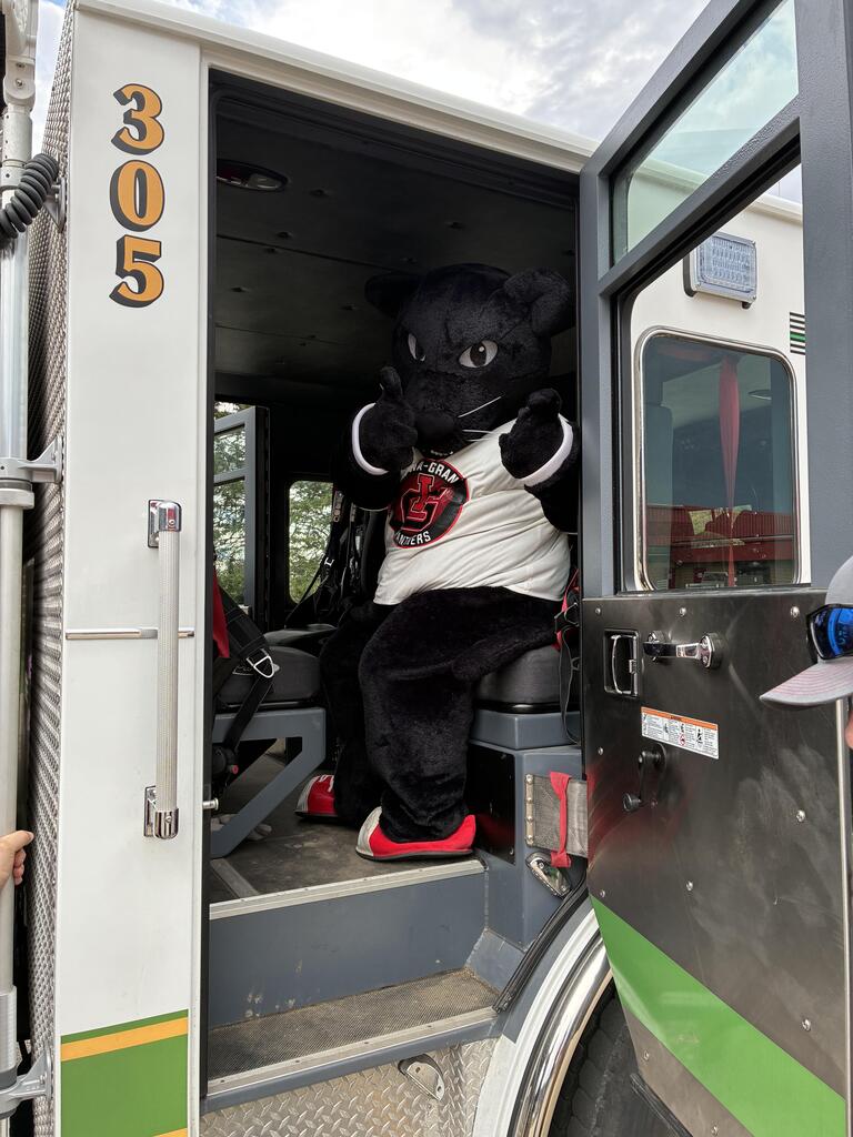 Panther taking the firetruck for a ride