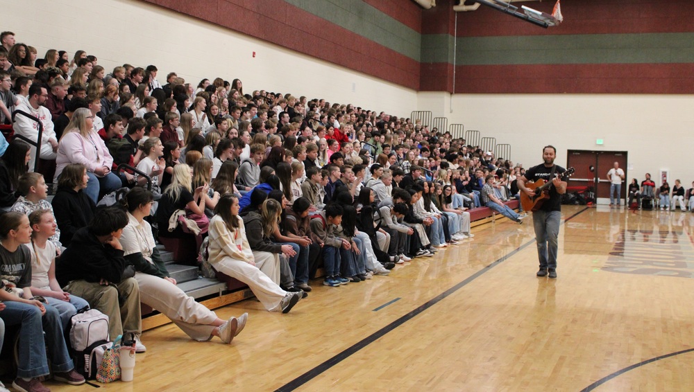 students sitting in bleachers