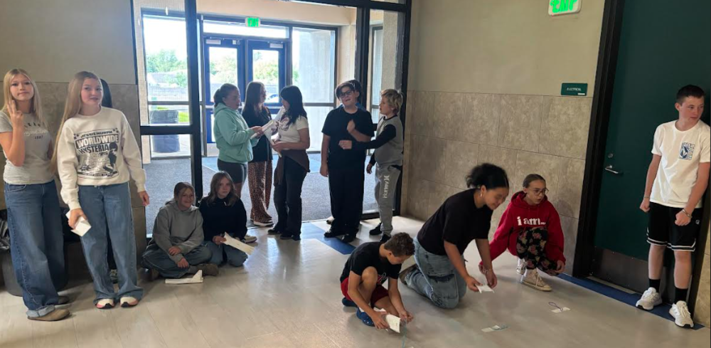 students racing skimmers