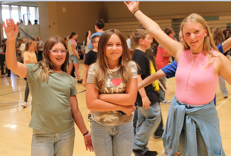 girls posing for back to school dance