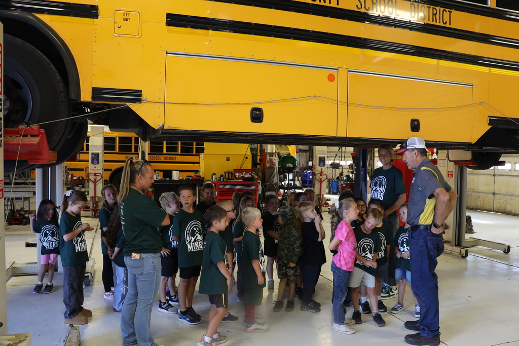 Students learn more about the mechanics of a bus.