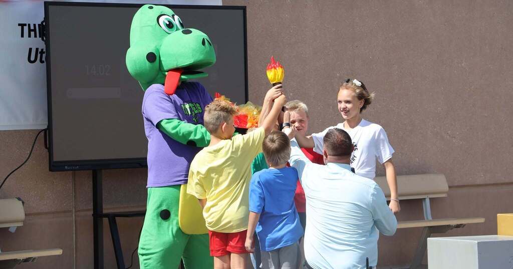 Students "light" the torch.