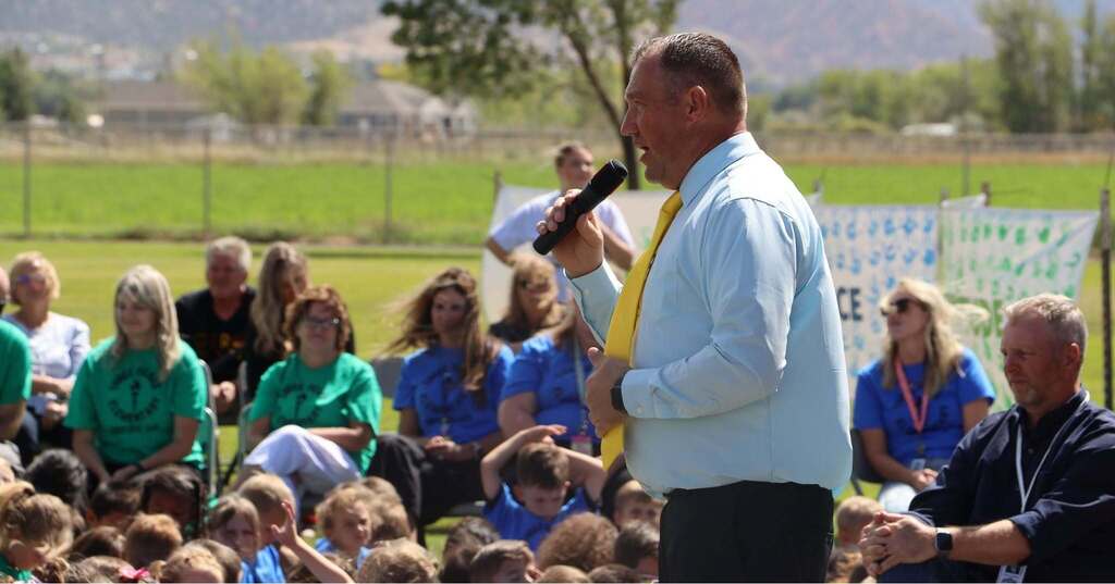 Principal Ike Spencer speaks at Three Peaks Elementary.