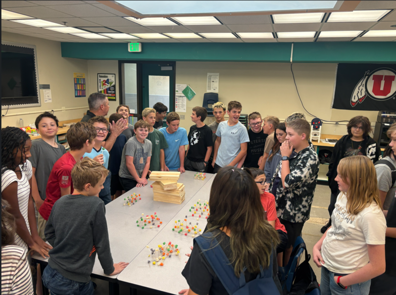 pic of Tim Watson helping students