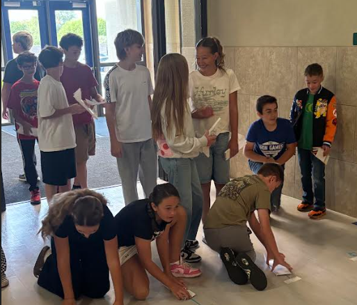 students racing skimmers in cca