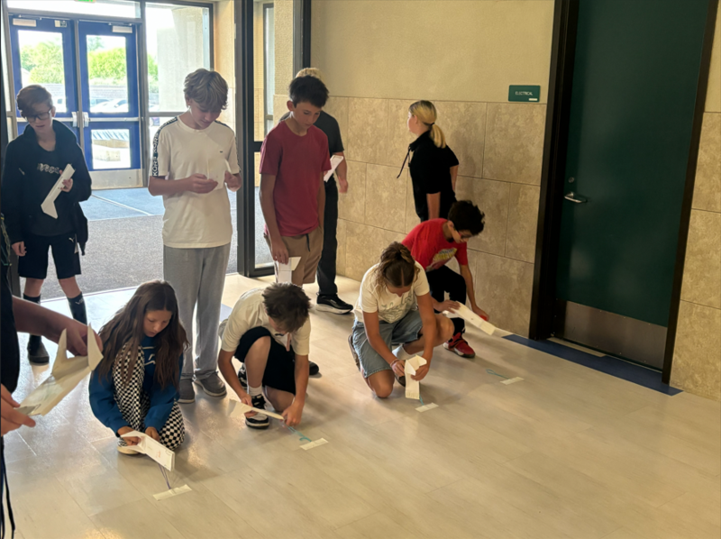 students racing skimmers in cca