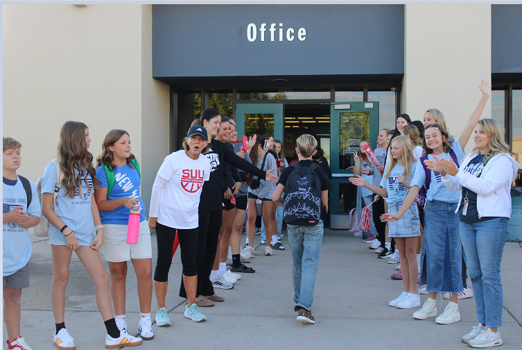 students entering building on first day of school
