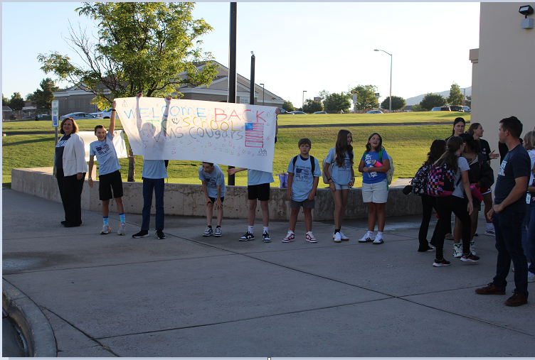 students entering building on first day of school