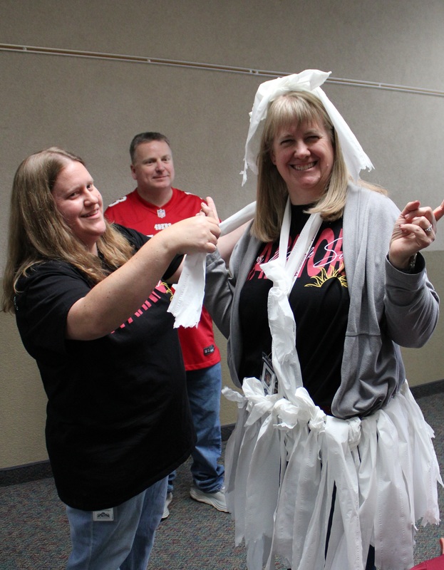 Teachers dressing up in crepe paper