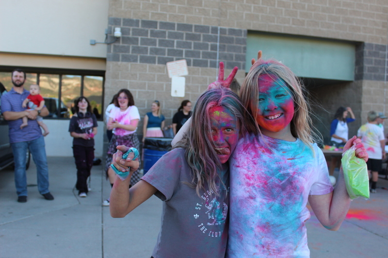 girls with chalk dust on their faces