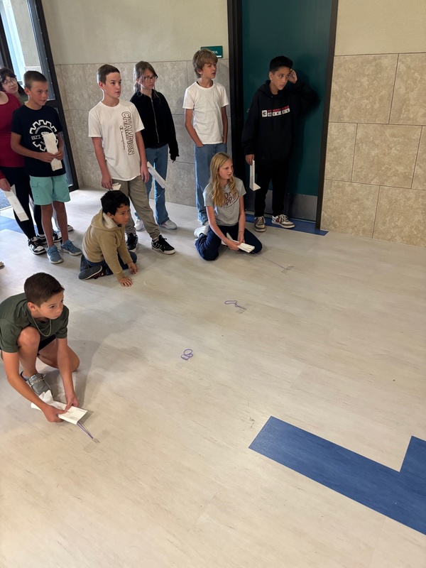 students racing skimmers