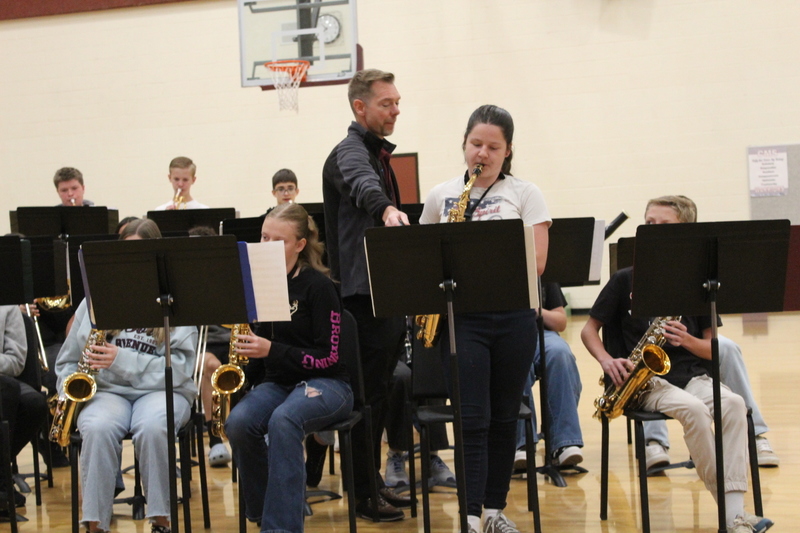 student playing the sax