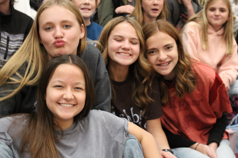 students sitting in bleachers