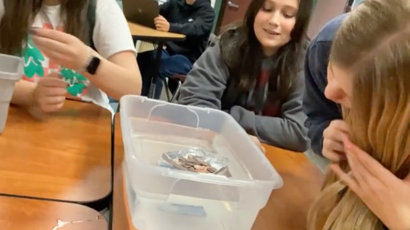 tin foil. boat in bucket of water