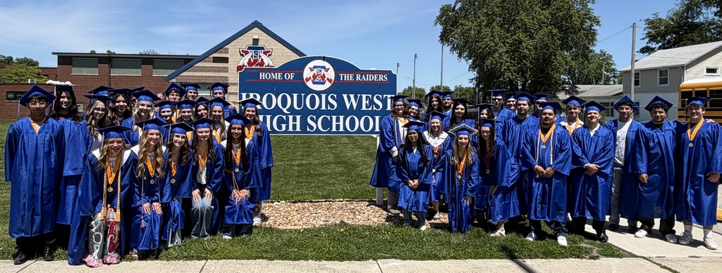 Class of 2026 with High School sign.