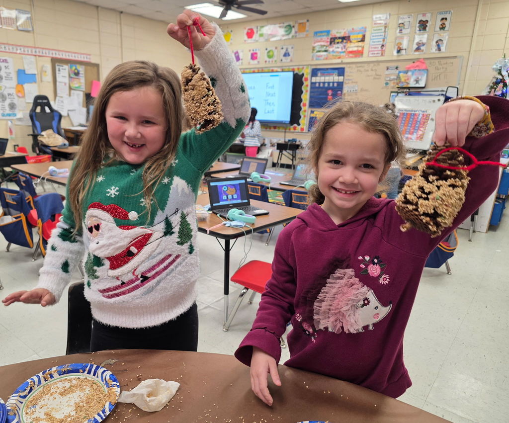 Mrs. Ariel Roberts' class creates pine cone bird feeders