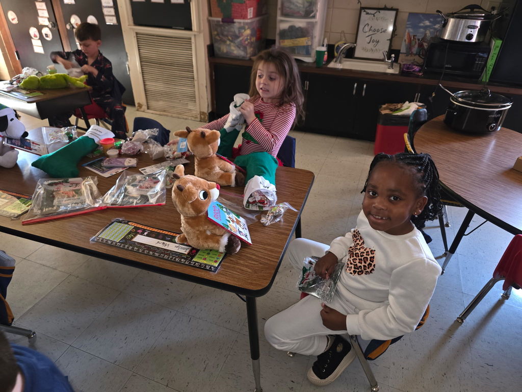Mrs. Ariel Roberts' class receives books and toys for Christmas