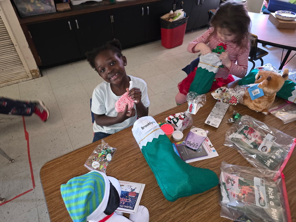 Mrs. Ariel Roberts' class receives books and toys for Christmas