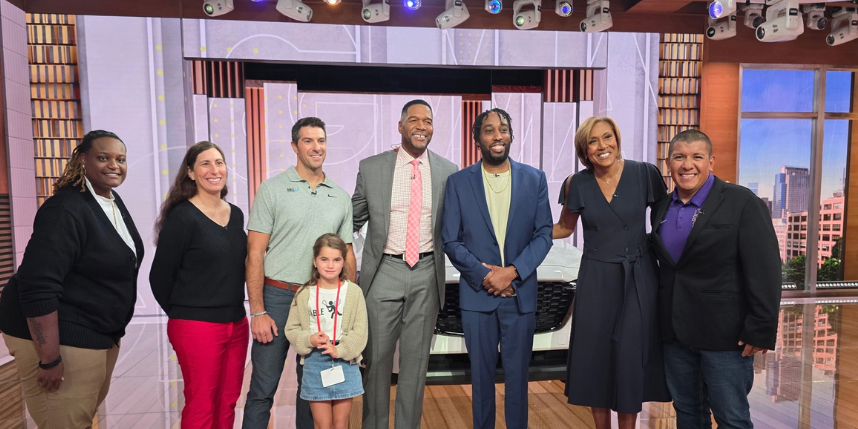 A group of coaches on set at Good morning america