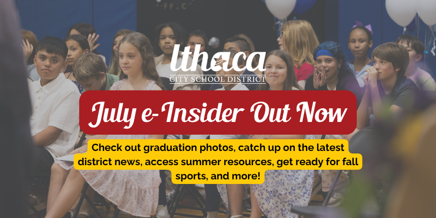 A group of people, possibly students, are gathered. Some sit on chairs, and others stand. White balloons are in the background. The July e-Insider is out now.