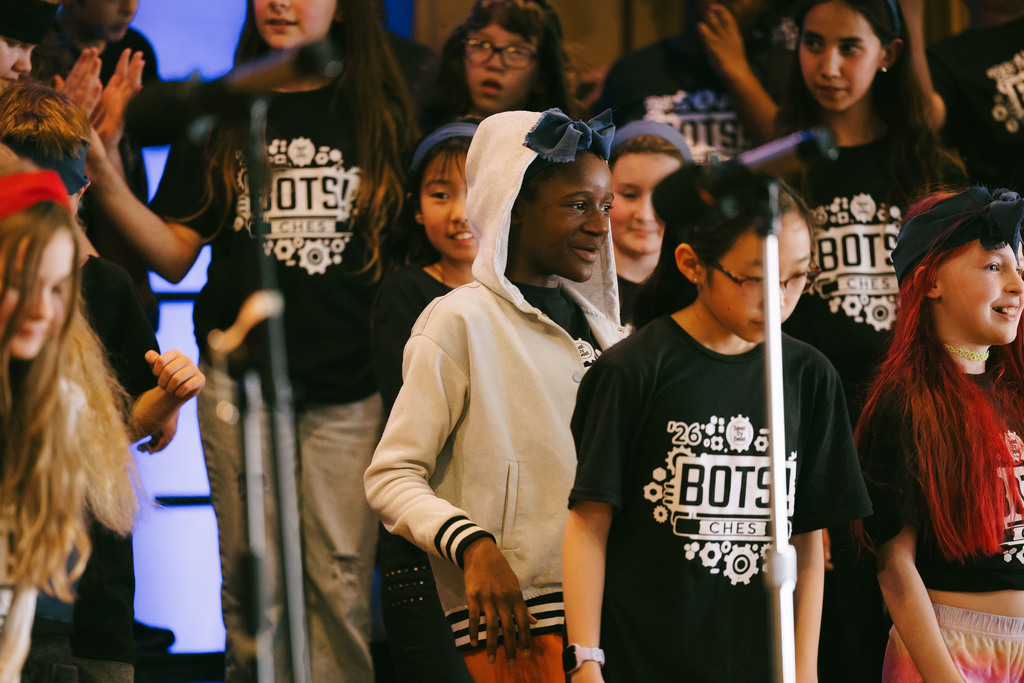 Cayuga Heights fifth graders on stage performing in the musical BOTS!