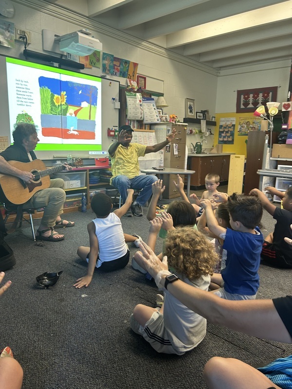 Cal Walker and John Simon perform for preK summer program